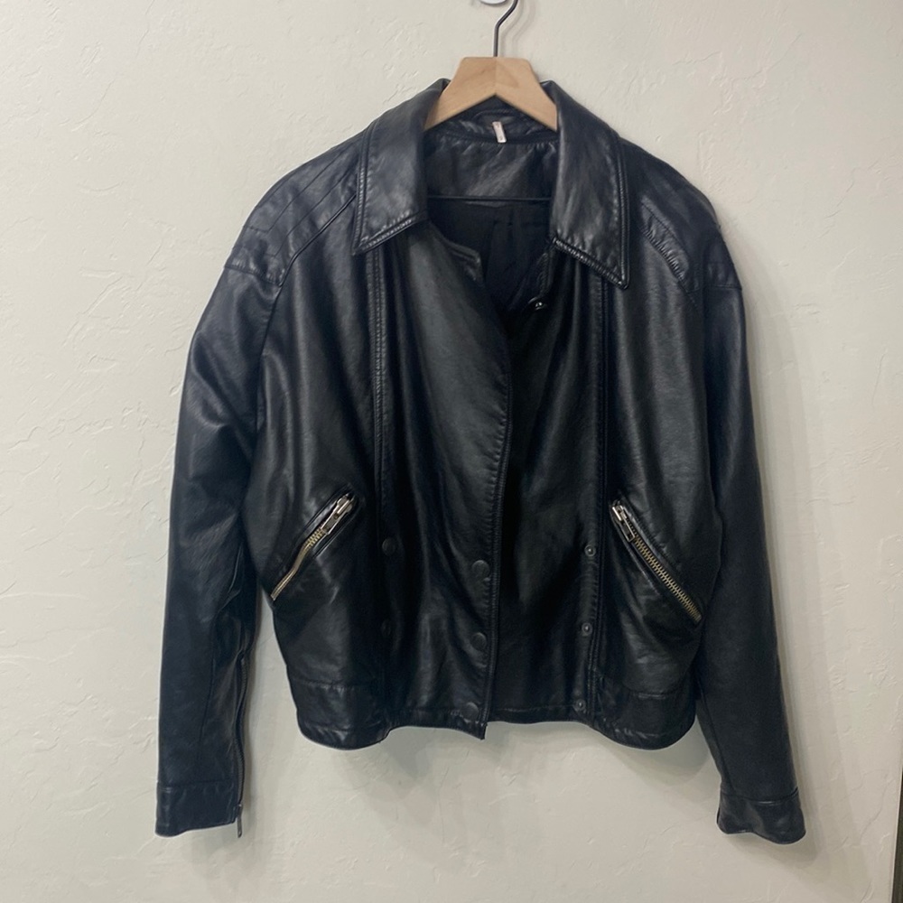 Free People black faux leather jacket, size small.